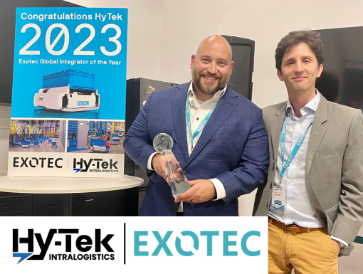Photo of Zac Boehm (Hy-Tek Intralogistics) accepting "Global Integrator Award" from Stanislas Normand (Exotec)